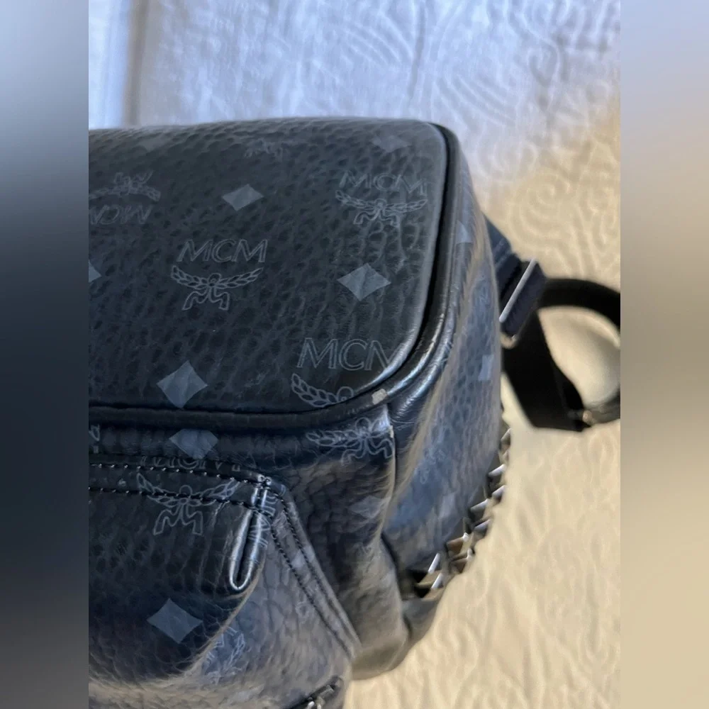 Stark Side Studs Backpack In Visetos, black side pockets w/stud details leather